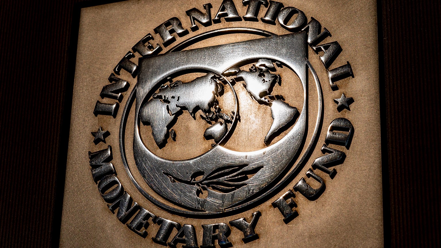 The logo of the International Monetary Fund is visible on their building, Monday, April 5, 2021, in Washington. 