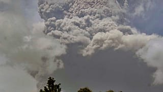 Plumes of ash rise from the La Soufriere volcano as it erupts on the eastern Caribbean island of St. Vincent, as seen from Chateaubelair, April 9, 2021.