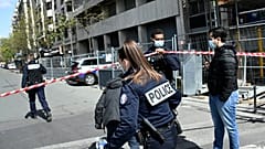French police cordon off the area near the Henry Dunant private hospital where one person was shot dead and one injured in a shooting, Paris April 12, 2021. 