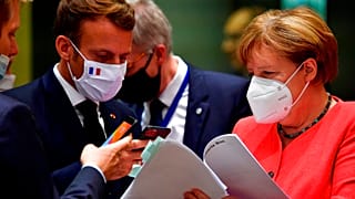 France's Macron and Germany's Merkel during an EU summit to agree on a COVID recovery fund