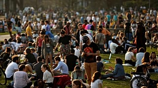Crowds gathered at Cinquantenaire park during a warm spring day in Brussels on 31 March.