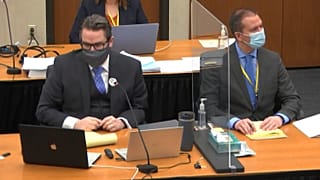 Defense attorney Eric Nelson (L) and defendant, former Minneapolis police officer Derek Chauvin (R) on April 14, 2021, at the Hennepin County Courthouse in Minneapolis.
