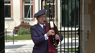 Robert Amyot MacKinnon playing the bagpipes