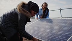 Locals buiding their solar power grid in Brixton, UK