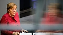 German Chancellor Angela Merkel delivers a speech in the Bundestag in Berlin, Germany, April 16, 2021.