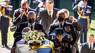 Pallbearers carry the coffin of Prince Philip, Duke of Edinburgh into St. George's Chapel at Windsor Castle, followed by members of his family
