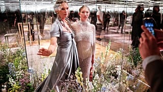 model Kate Moss, left, and her daughter Lila Grace Moss wear a creation for Fendi's Spring-Summer 2021 Haute Couture fashion collection presented in Paris on Jan. 27, 2021.