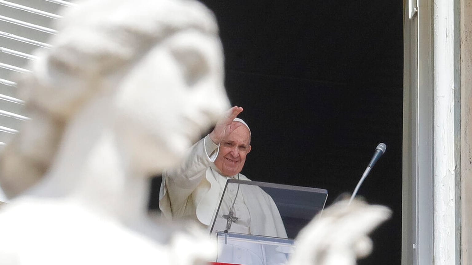 Pope Francis delivers his blessing to crowds St. Peter's Square at the Vatican on Sunday, April 18, 2021