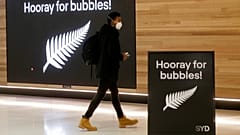 A passenger at Sydney Airport to catch a flight to New Zealand, Monday, April 19, 2021,