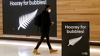 A passenger at Sydney Airport to catch a flight to New Zealand, Monday, April 19, 2021,