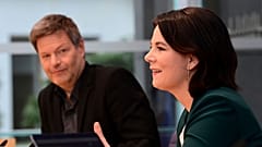 The leaders of Germany's Green party Annalena Baerbock, right, and Robert Habeck attend a press conference in Berlin, Germany on March 15, 2021.