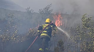 A fire rages on the slopes of Table Mountain, in Cape Town South Africa.