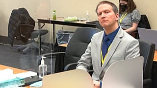 Former Minneapolis police Officer Derek Chauvin listens as his defense attorney Eric Nelson gives closing arguments. April 19, 2021