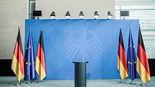 The lectern of German Chancellor Angela Merkel is pictured before a statement