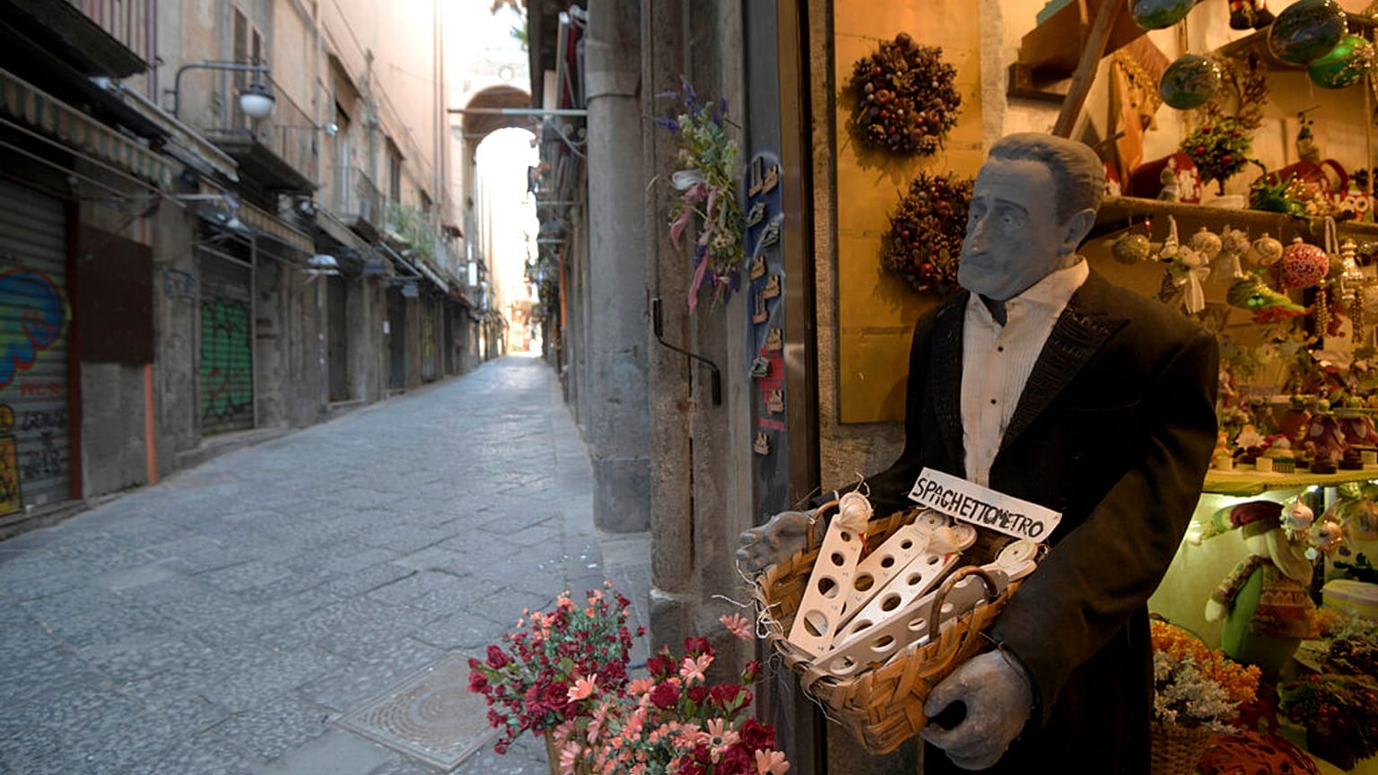 Via San Gregorio Armeno, famous for its statuettes, is empty, in downtown Naples, southern Italy, Wednesday, March 11, 2020. 