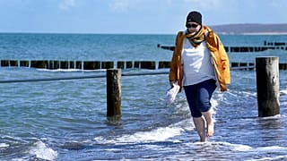 Simone Ravera, patient of the 'MEDIAN Clinic Heiligendamm', exercises after an interview with the Associated Press in Heiligendamm, Germany, on April 14, 2021.