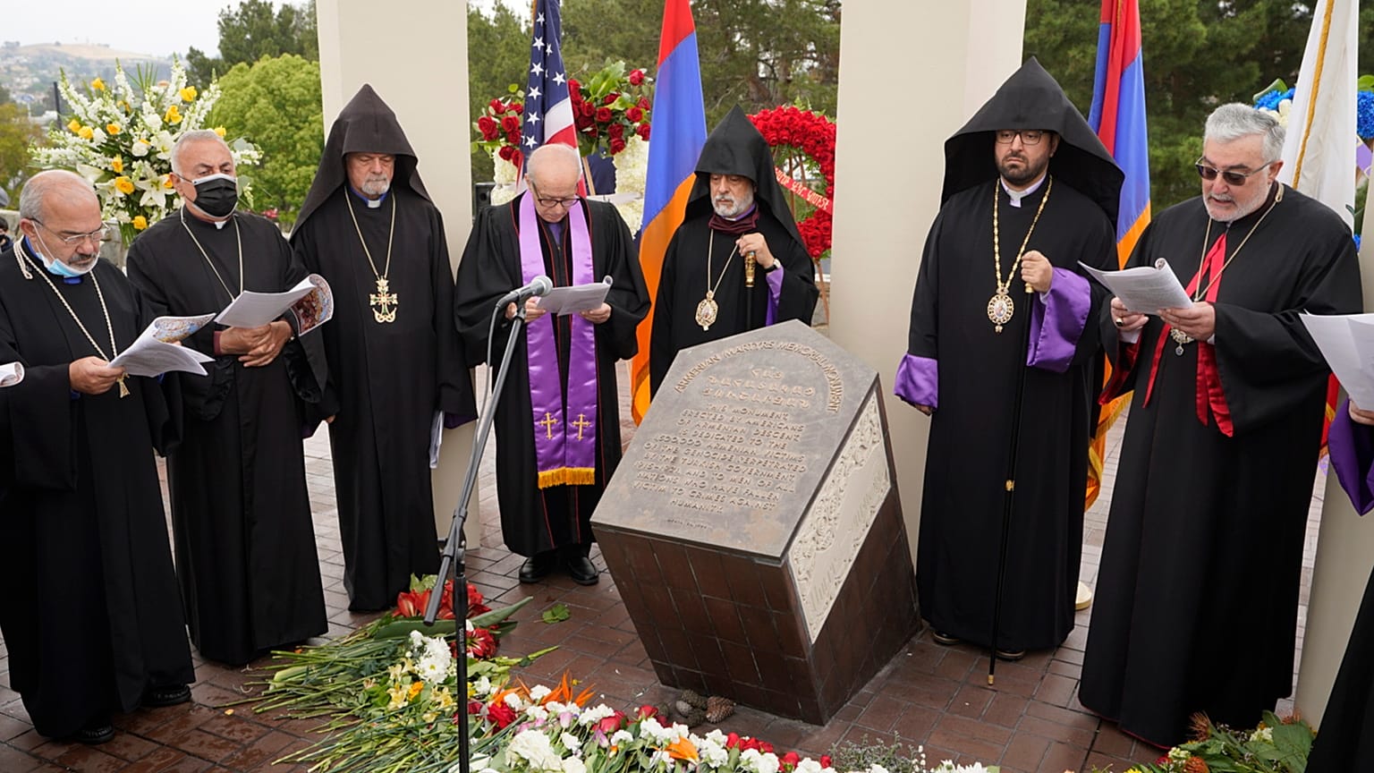 Religious leaders sing at a ceremony at the Montebello Armenian Genocide Monument in Montebello, Calif., Saturday, April 24, 2