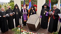 Religious leaders sing at a ceremony at the Montebello Armenian Genocide Monument in Montebello, Calif., Saturday, April 24, 2