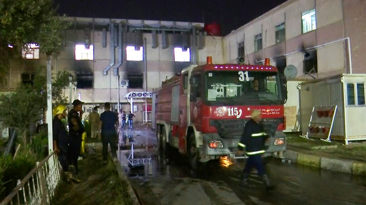 First responders work the scene of a hospital fire in Baghdad on Saturday, April 24, 2021