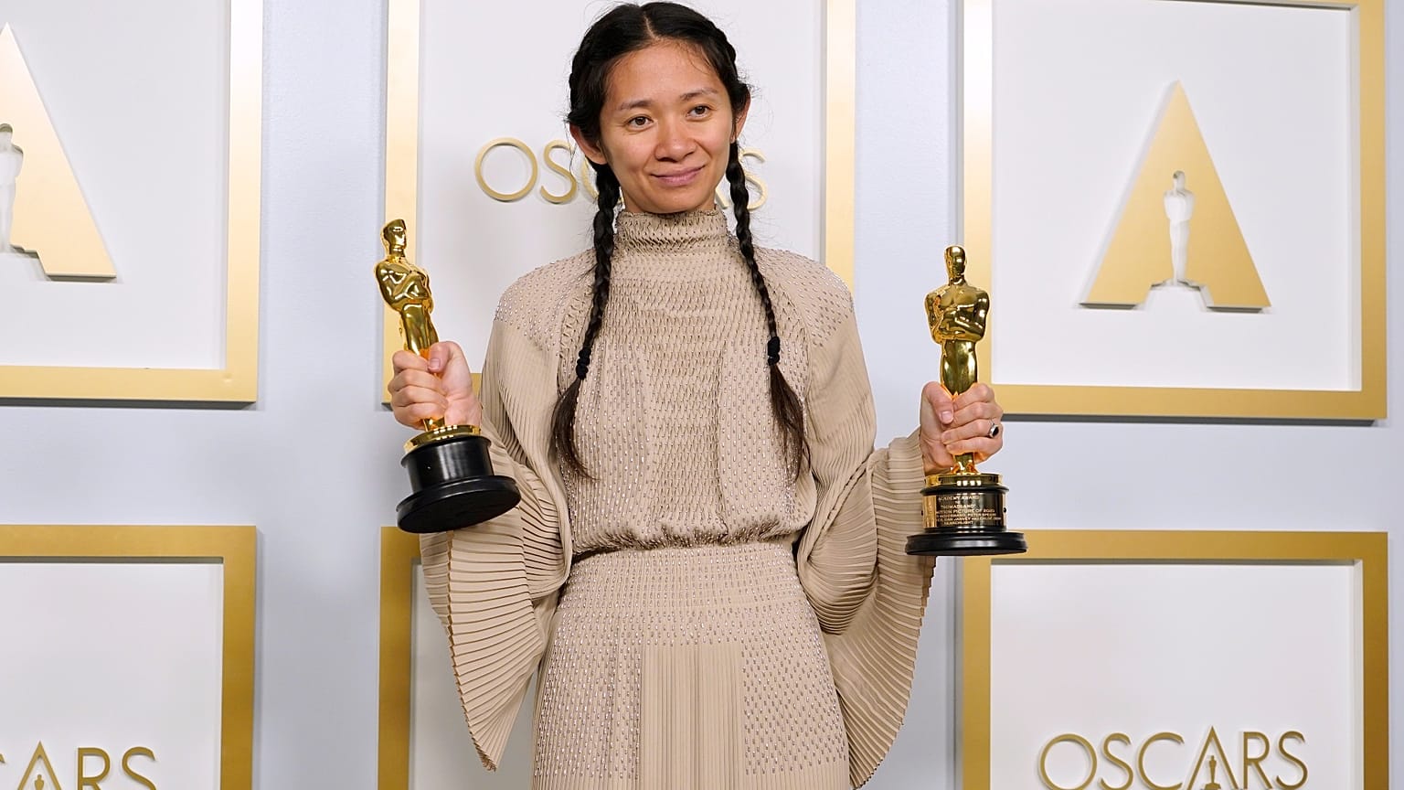 Chloe Zhao, winner of the awards for best picture and director for "Nomadland," poses in the press room at the Oscars on April 25, 2021, in Los Angeles.