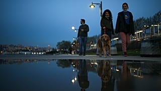People walk in central Istanbul, Monday, April 26, 2021. 