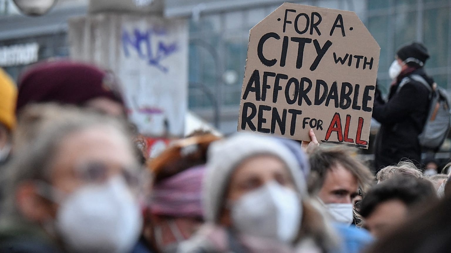 People take part in a protest march against the the Federal Constitutional Court's rulling on Berlin's rent cap law in Berlin on April 15, 2021