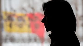 In this Feb. 22, 2019, file photo Moldova's President Maia Sandu, then leader of the ACUM opposition alliance, speaks to people during an electoral meeting;