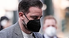 Christoph Metzelder arrives at the court in Duesseldorf  for the opening of his trial.