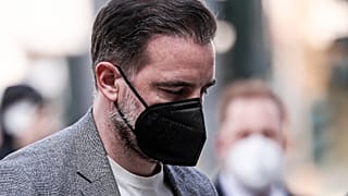 Christoph Metzelder arrives at the court in Duesseldorf  for the opening of his trial.