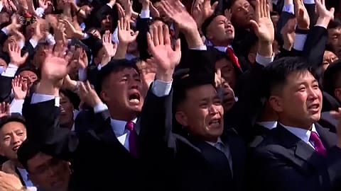 People clapping and cheering at the "Socialist Patriotic Youth League"