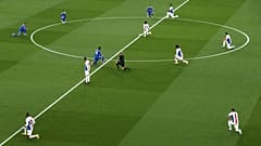 Players 'take a knee' in support of the No Room For Racism campaign ahead of the Leicester City vs Crystal Palace Premier League match on April 16, 2021.