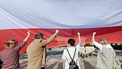 FILE: People demonstrate on the 20th anniversary of Poland’s constitution in front of the presidential palace in Warsaw, Poland, on Sunday, April 2, 2017. 