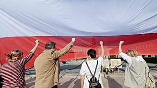 FILE: People demonstrate on the 20th anniversary of Poland’s constitution in front of the presidential palace in Warsaw, Poland, on Sunday, April 2, 2017.