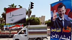 تصویر بشار اسد در سطح شهر