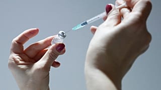 Medical worker prepares to administer a COVID-19 vaccine in Belgrade, Serbia