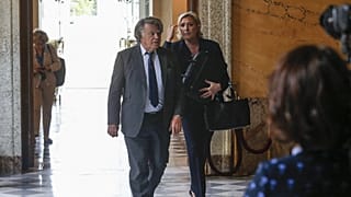 (FILE) French far-right leader Marine Le Pen (R) and Member of Parliament Gilbert Collard arrive at the arrive at the French National Assembly in Paris, 2017.