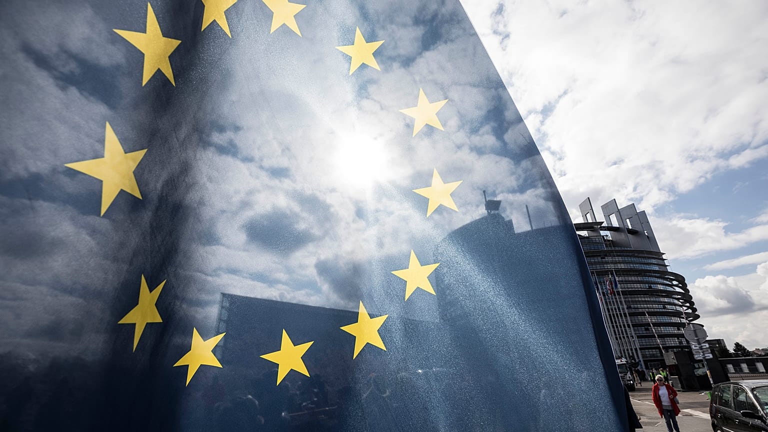 An EU flag flies at the front of the European Parliament building in Strasbourg, France, Tuesday March 26, 2019.
