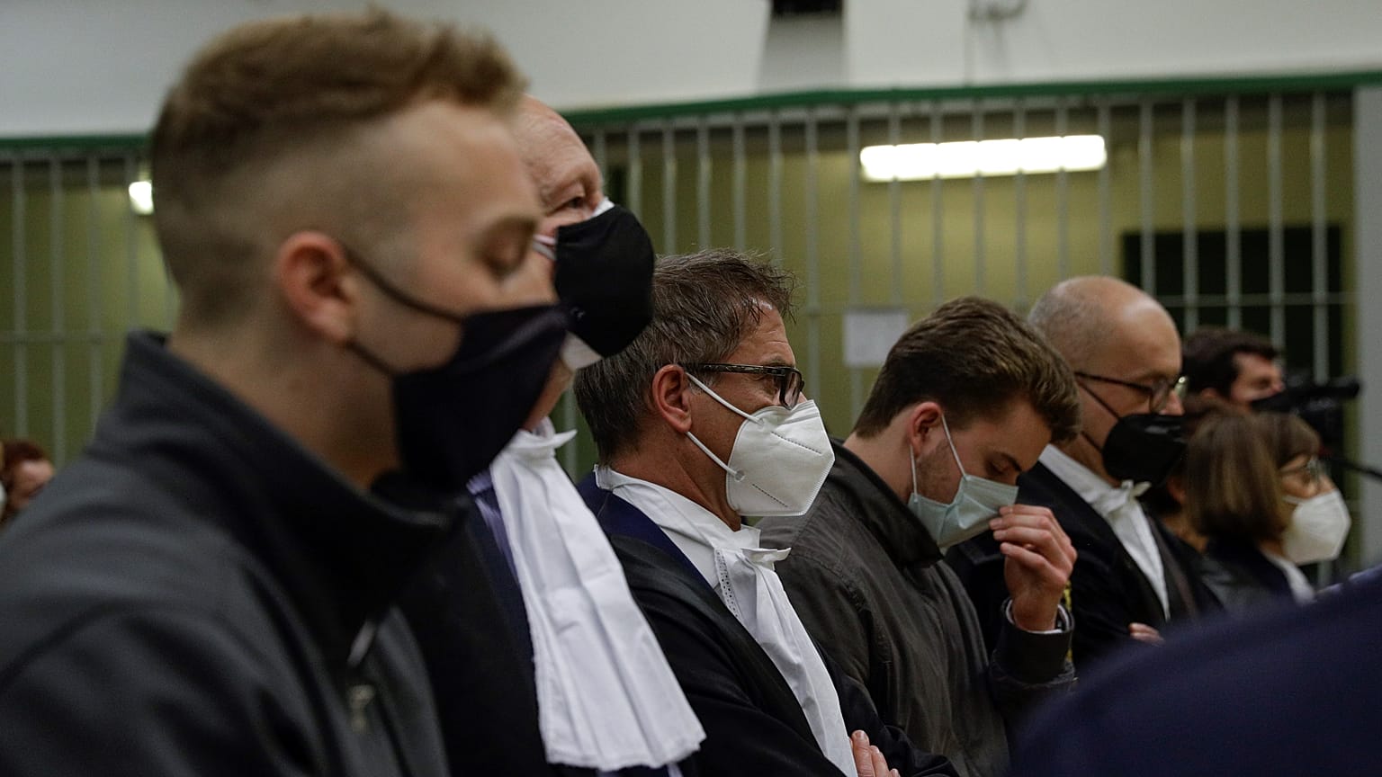 Finnegan Elder, left, and Gabriel Natale-Hjorth, fourth from left, hear the verdict in their murder trial