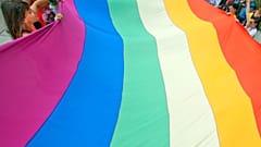 Gay rights activists carry the rainbow flag during a 2012 Pride march in Split, Croatia.