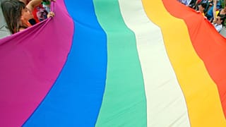 Gay rights activists carry the rainbow flag during a 2012 Pride march in Split, Croatia.