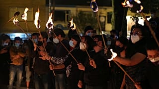 Eine Mahnwache für die Opfer von Polizeigewalt in Bogotá