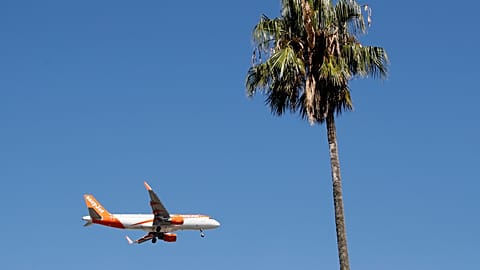 FILE - In this Aug. 21, 2019 file photo, an easyJet airplane approaches Lisbon airport for landing. 
