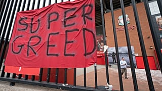 A protest banner against the proposed Super League is seen outside Liverpool's Anfield Stadium in April 2021.