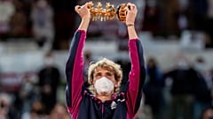 Germany's Alexander Zverev holds the trophy after winning the men's final match against Italy's Matteo Berrettini