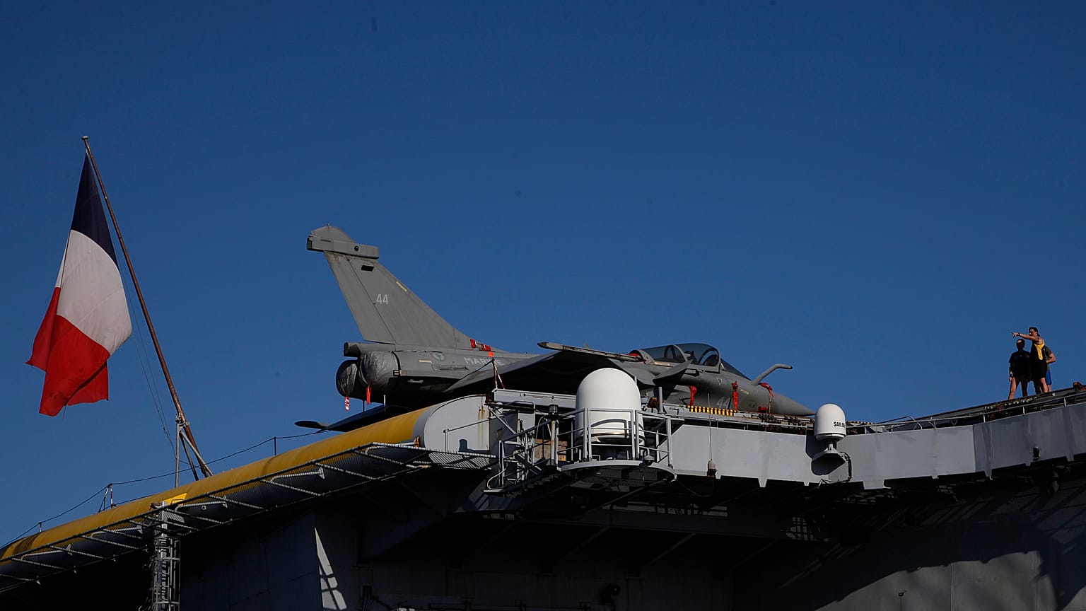 Nuclear-powered aircraft carrier Charles de Gaulle with with a French flag at Limassol port, Cyprus