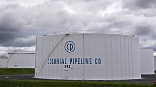 Colonial Pipeline storage tanks are seen in Woodbridge, New Jersey on Monday, 10 May, 2021. The company has been hit by a major cyberattack.
