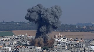 Smoke rises after an Israeli airstrike in Gaza in Gaza City, Tuesday, May 11, 2021.