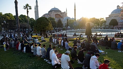 Muslims offer prayers during the first day of Eid al-Fitr, which marks the end of the holy month of Ramadan, outside the Byzantine-era Hagia Sophia.