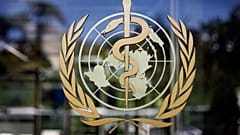 The logo of the World Health Organization is seen at their headquarters in Geneva, Switzerland.