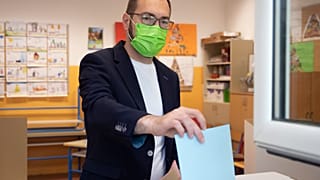 Zagreb Mayoral candidate Tomislav Tomasevic casts his ballot, at a polling station in Zagreb, Croatia, Sunday, May 16, 2021. 